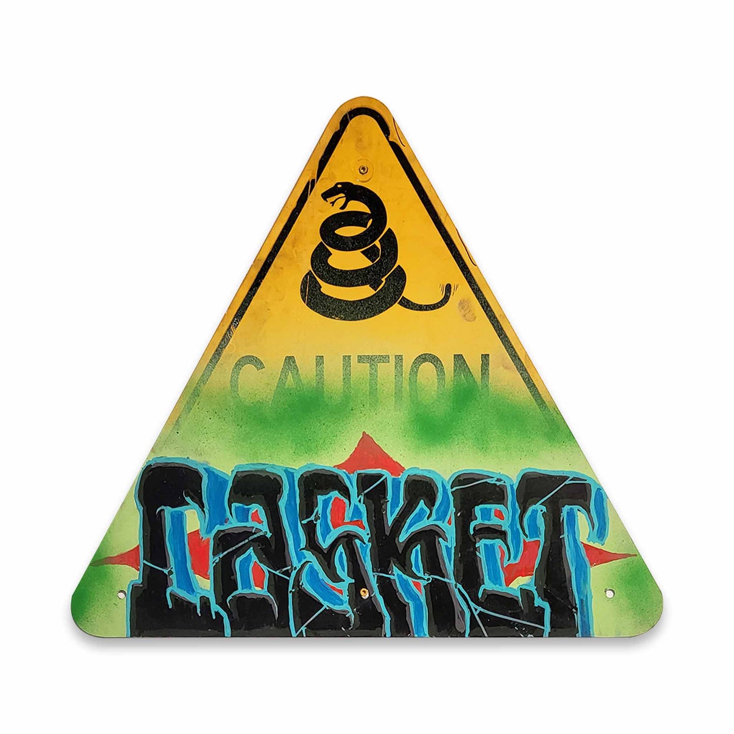 Triangular warning sign with snake symbol and spray-painted text of CASKET on a white background.