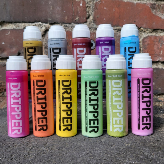 Dope Paint Artist Mop Markers in colors gold, silver, violet, light blue, light pink, yellow, green, and orange.