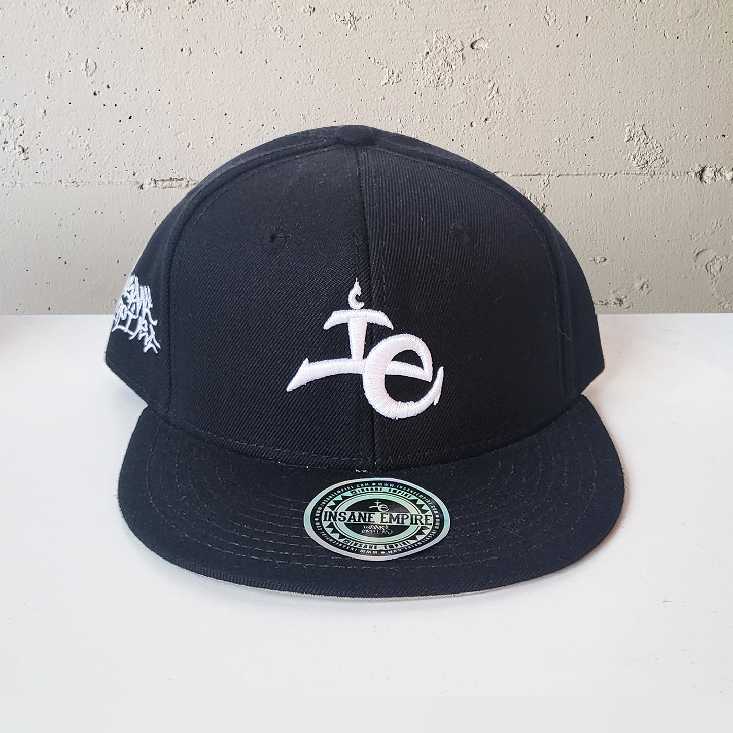 Local artist clothing brand inland empire black and white snap back