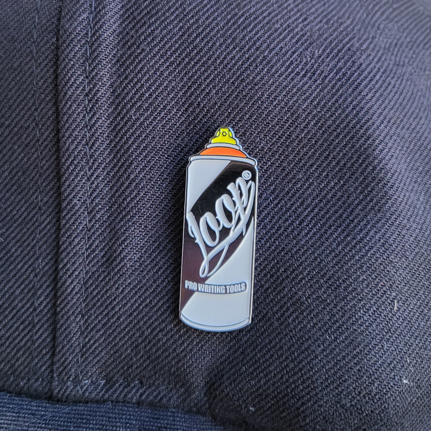 Loop Colors aerosol paint brand mini enamel decorative pin.