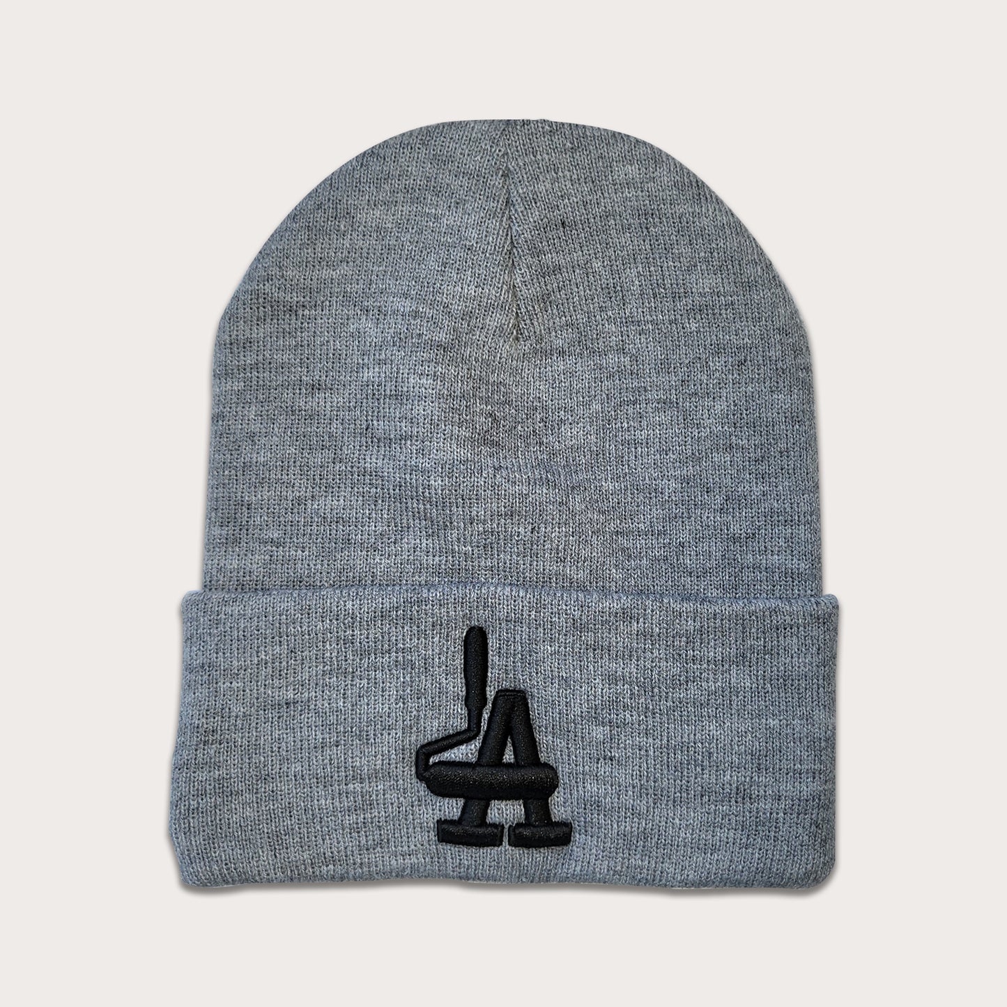 Locally owned graffiti brand Phatcaps, woven medium grey beanies with black puff embroidery.