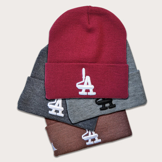 Locally owned graffiti brand Phatcaps,  woven beanies with puff embroidery.