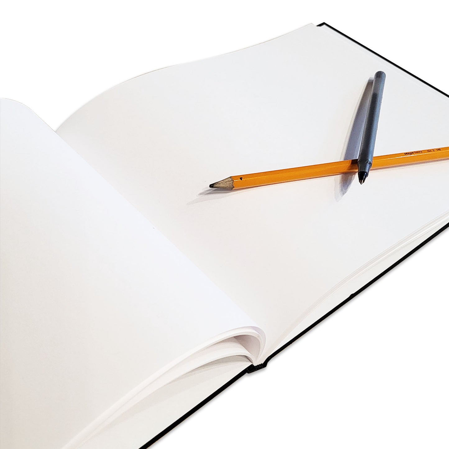 An open blank sketchbook with white pages, shown on a white background with two pens resting on top.