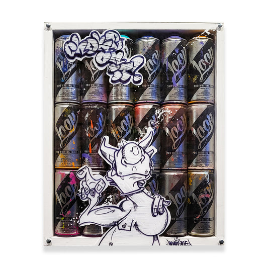 White shadow box filled with spray paint cans and covered with clear plexiglass by artist Man One.