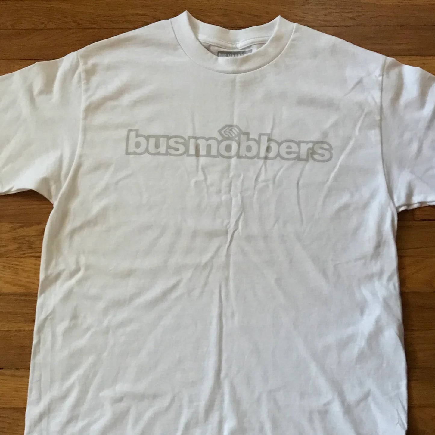 White Bus mobber "standard" t-shirt with a bus mobber type grey print on the front chest area.