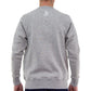 Light grey crew neck sweater with "LP" embroidered on the back in white