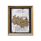 Gold framed metal sign with grafiti writing in gold