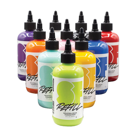 Set of colorful SF Refill paint bottles on a white background