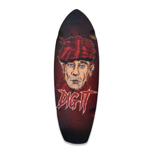Painted portrait of Ed Gein with words Dig It on skateboard deck