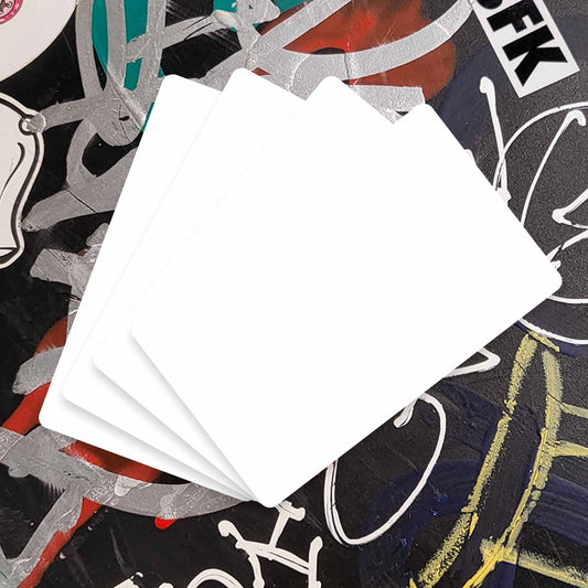 Blank white sticker pack on black background with colorful writing.