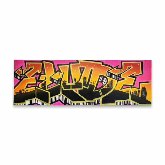 A graffiti painting of stylized letters encasing a city scape.