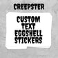 A stack of white custom text stickers with black distressed font reading 'CREEPSTER' and 'CUSTOM TEXT EGGSHELL STICKERS' on a gray textured background.