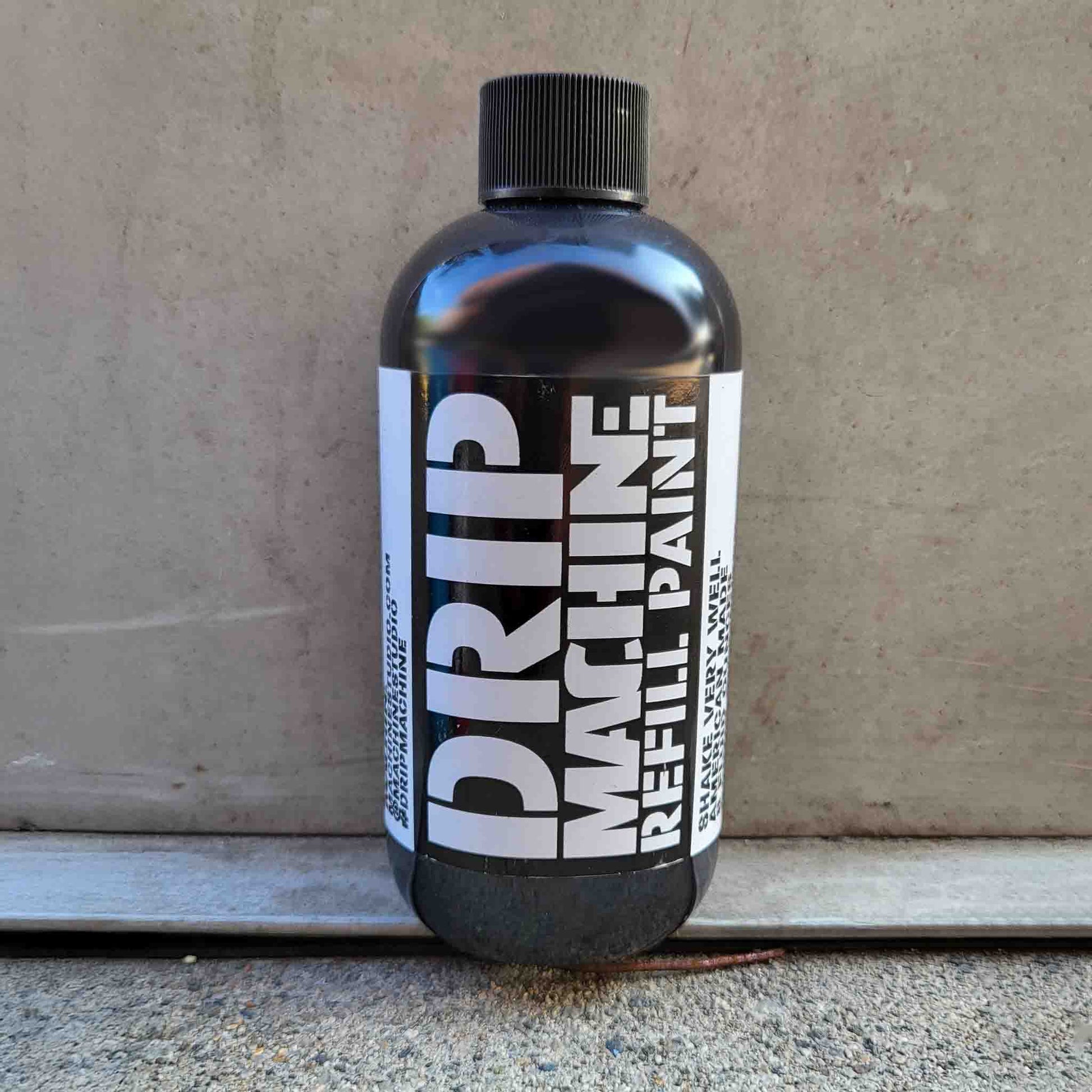 Bottle of Drip Machine Refill Paint in black