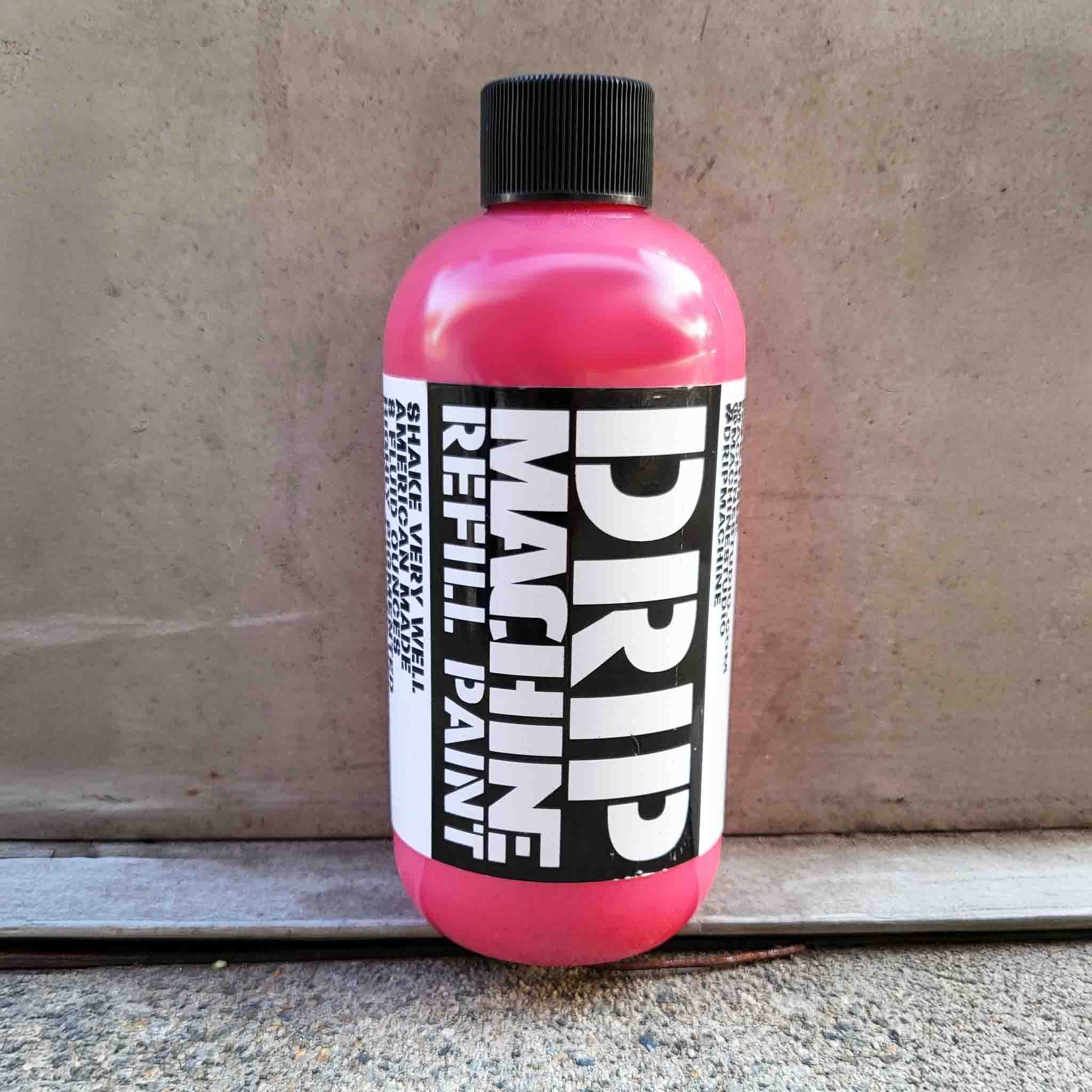 Pink bottle of Drip Machine Refill Paint.