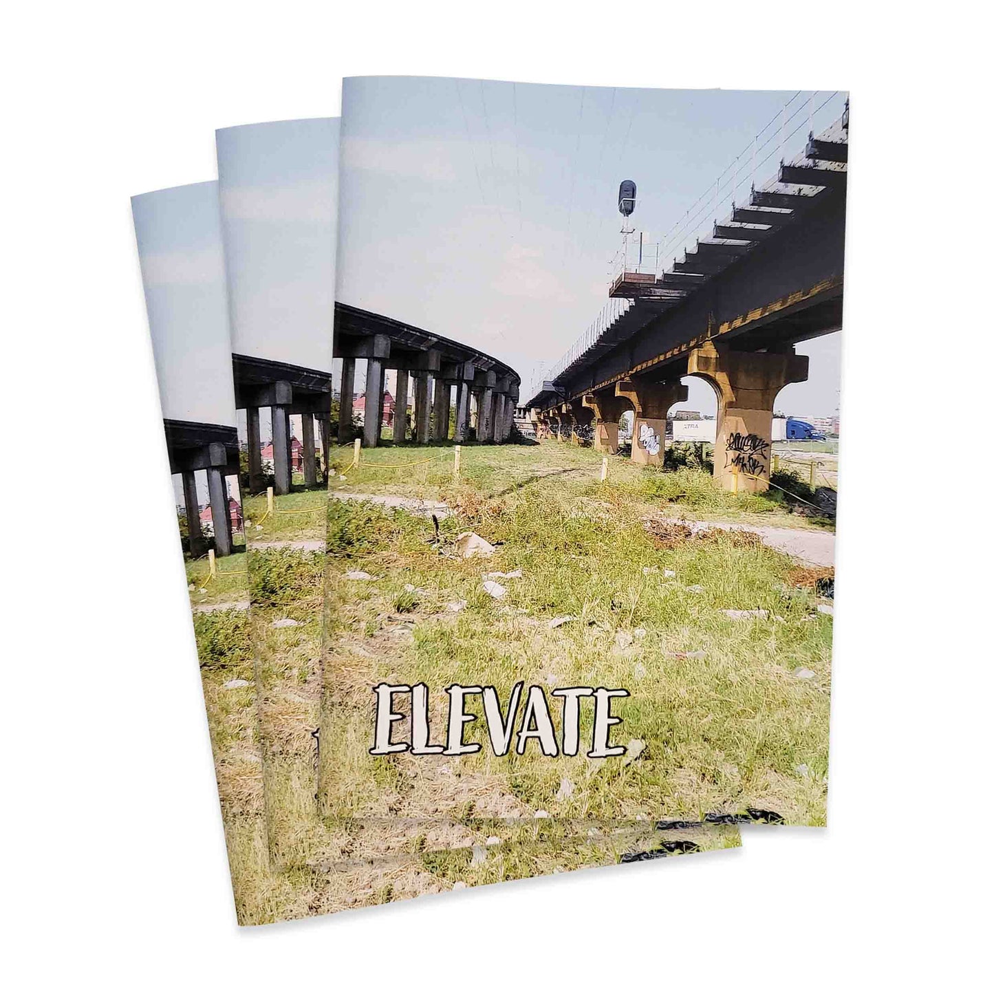 Two books with a cover featuring an overpass and the word 'Elevate'.