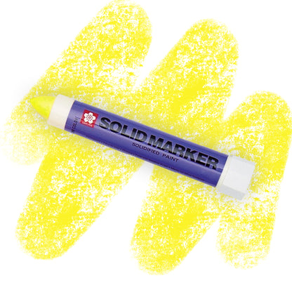 A fluorescent yellow marker with a purple label that reads " SOLID MARKER" with a fluorescent yellow crayon swatch.