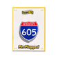 Enamel pin with Interstate 605 design on a white background.