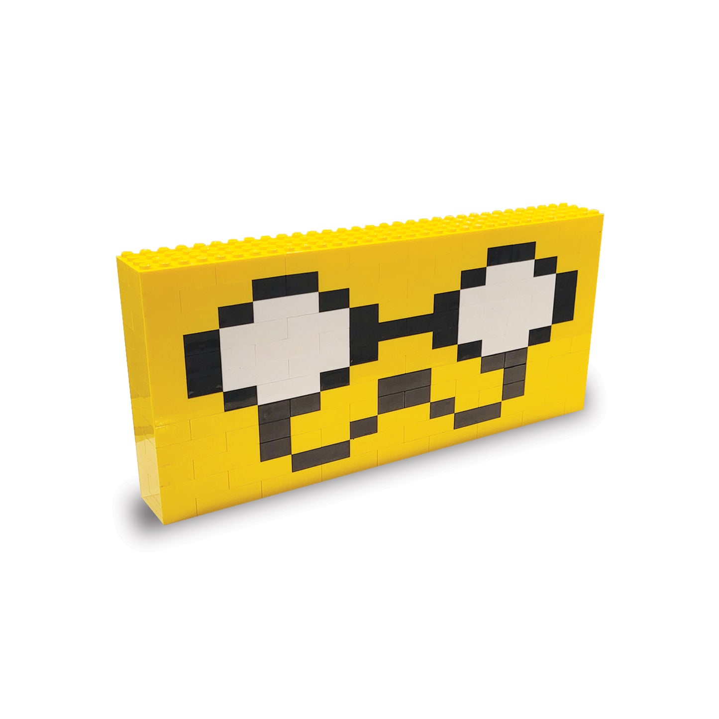Yellow pixelated 3D lego sculpture of Jake the Dog.