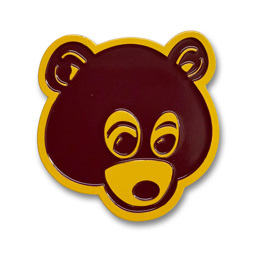 Bear face design with yellow accents on a white background.