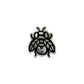 Metallic bee-shaped pin on a white background.