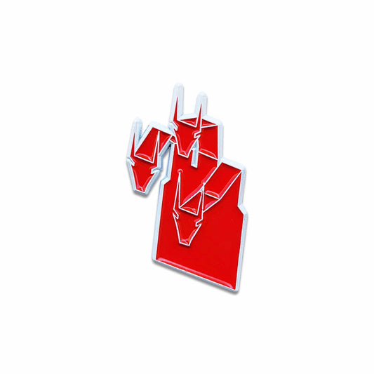 Red and white enamel pin of King Geedorah