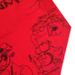 Red canvas bag with various graffiti style drawings.