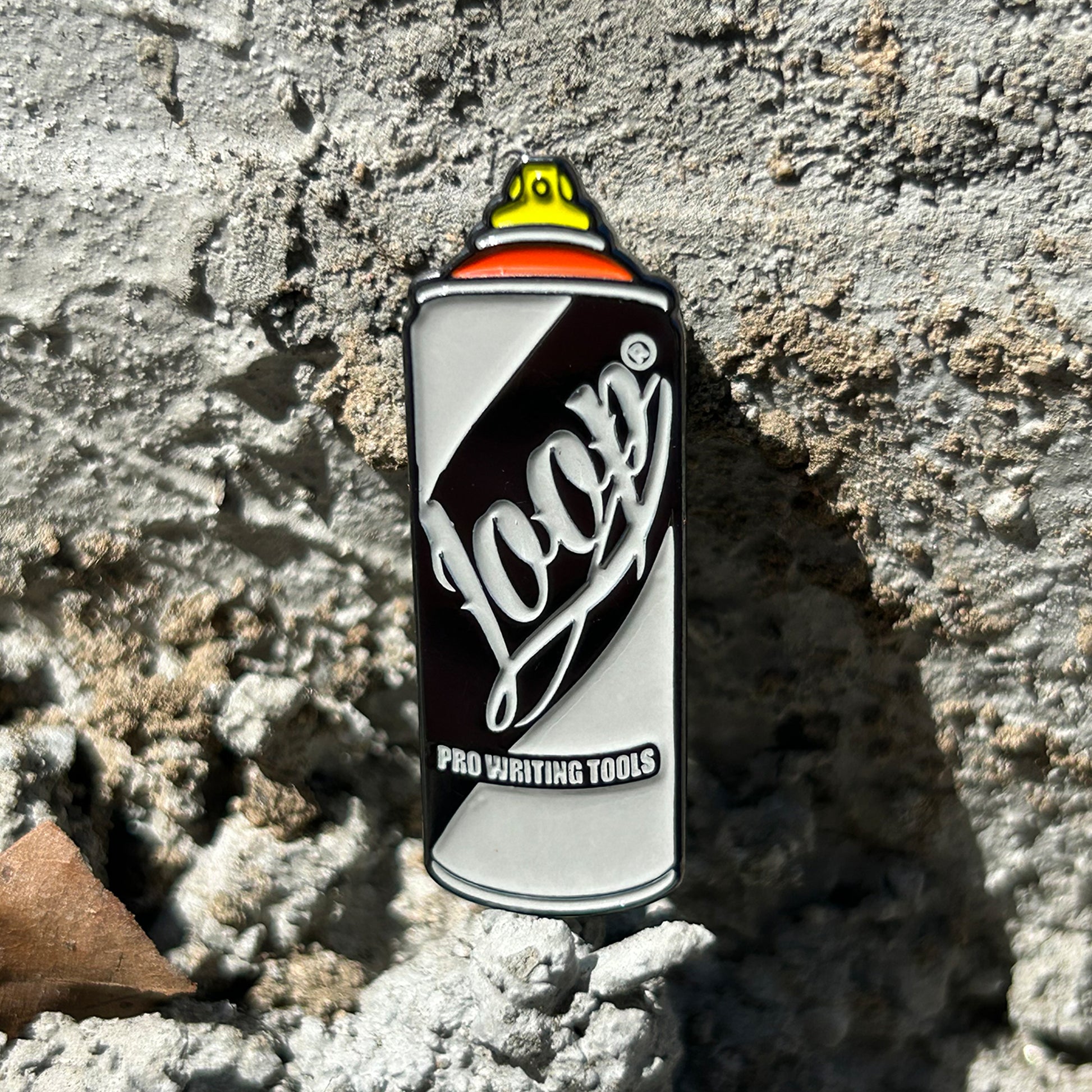 Loop Colors aerosol spray paint mini enamel pin.