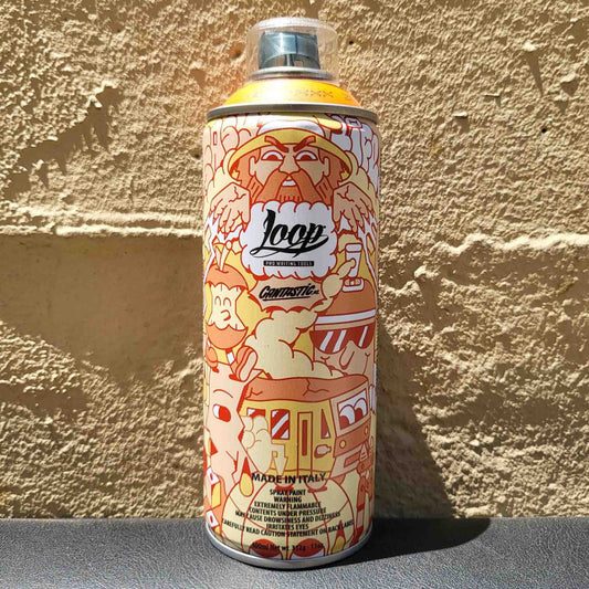 Loop spray paint can with orange graphic design against a textured wall