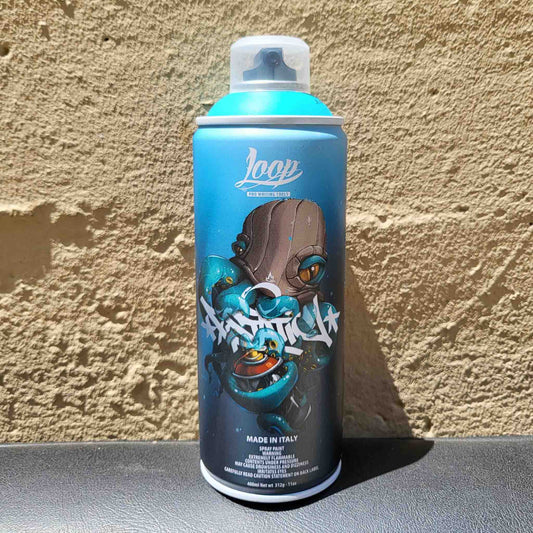 Loop Colors pray paint can with a graffiti style graphic design on a textured wall background