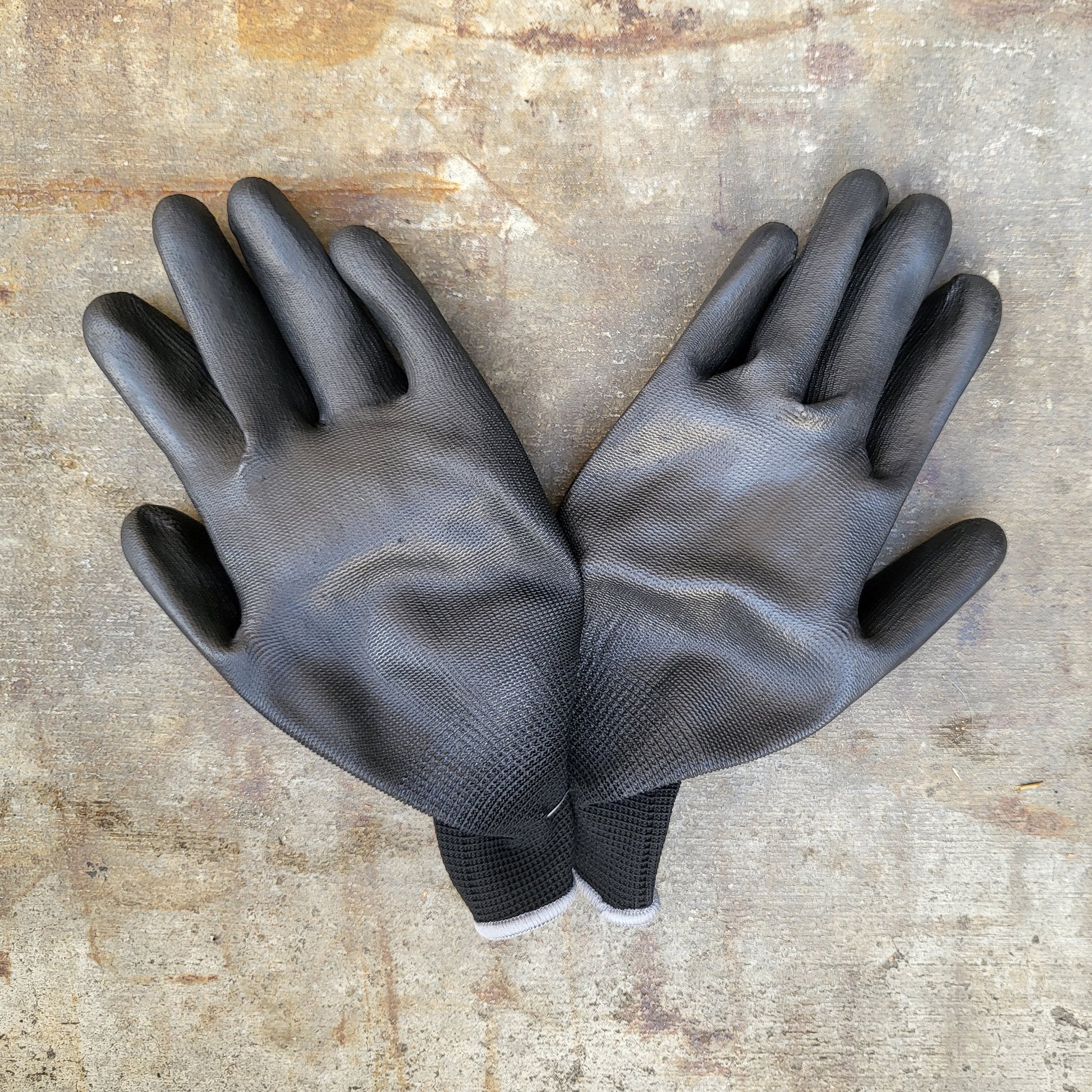 Loop spray paint and Mr. Serious coated, protective painting gloves under side.