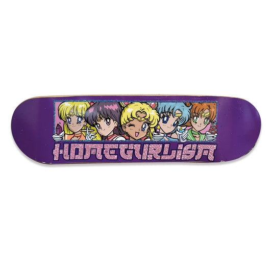Skateboard deck with Sailor Moon anime characters and 'HOMEGURLISM' text.
