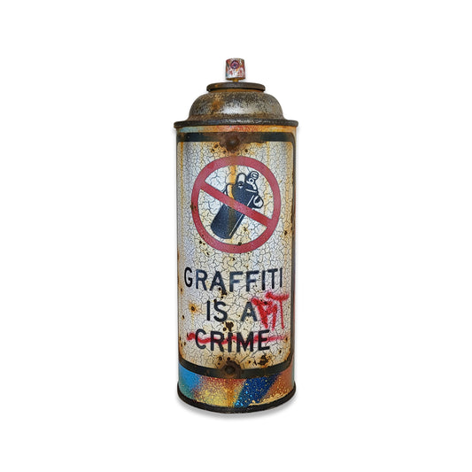 Old spray paint can with label reading graffiti is a crime
