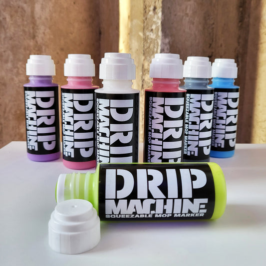 Graffiti dripper, mop, squeezer, acrylic paint ink markers in a variety of colors.