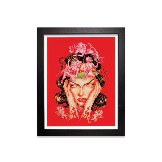 Framed artwork of a stylized face with cherubs on a red background