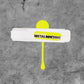 White marker with lime yellow label and a lime yellow swatch in the back ground.