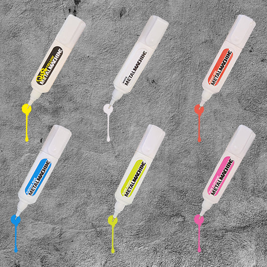 6 muticolored metal tipped markers labeled Metal Machine