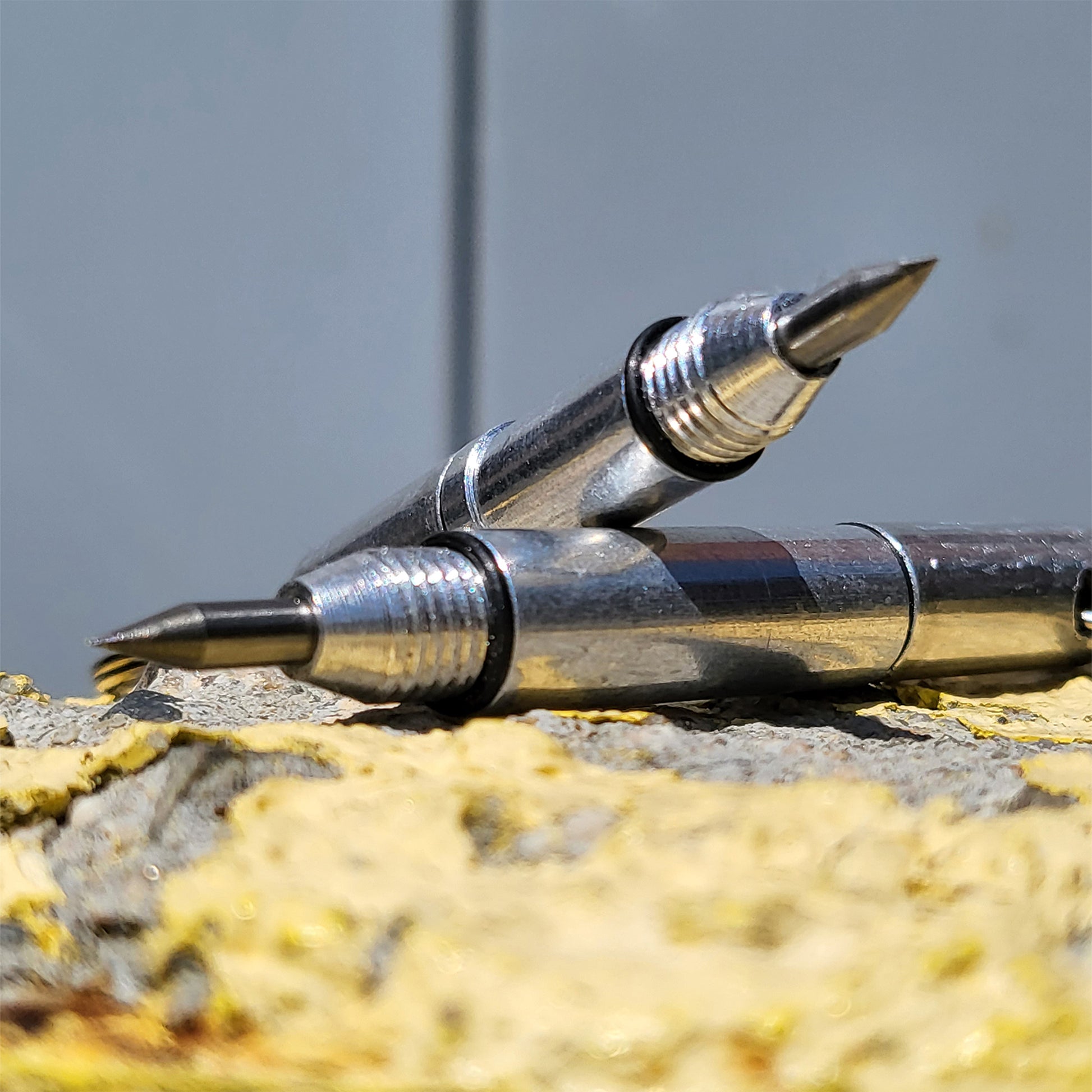 Two silver keychain scribes