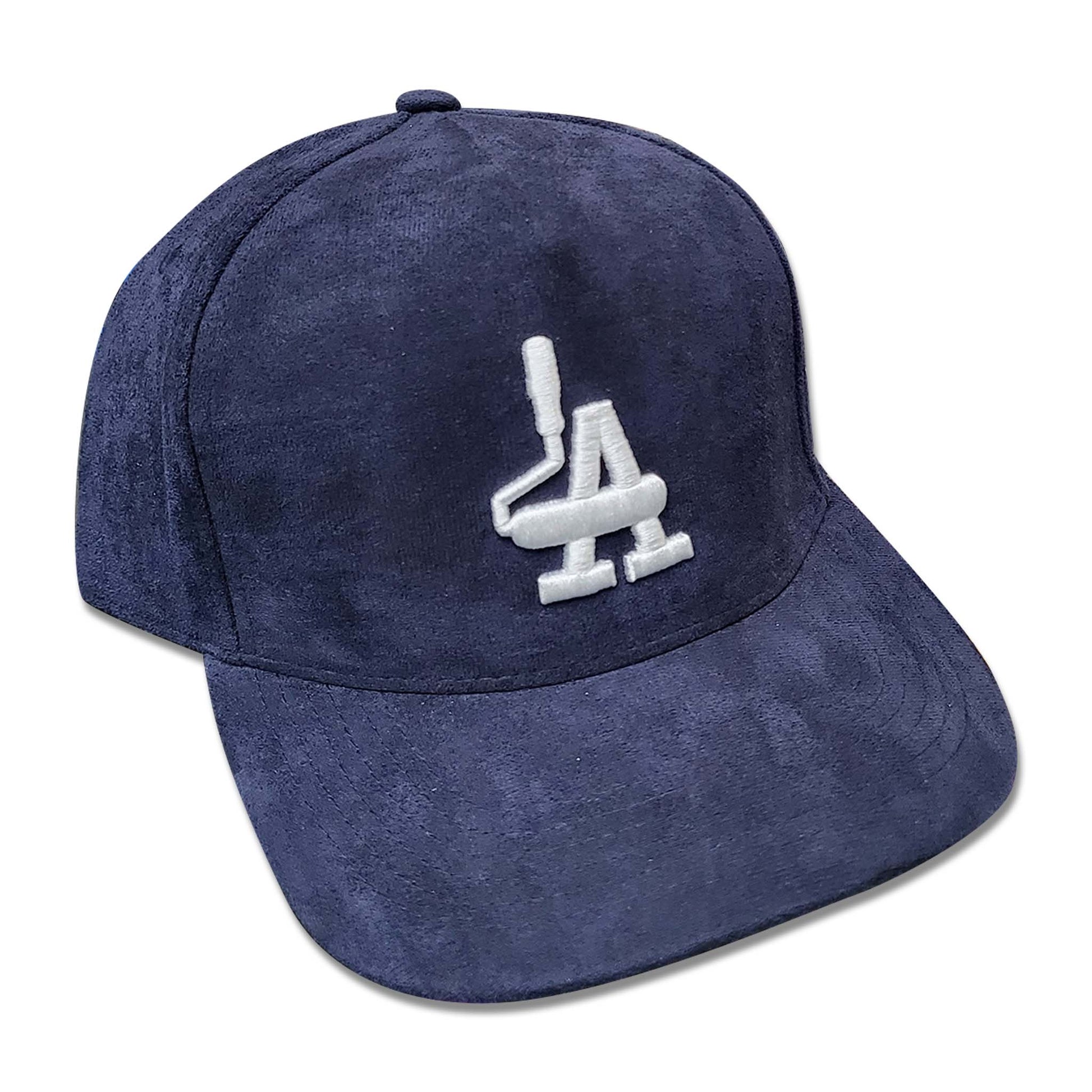 Navy suede hat with white embroidery of paint rollers in the shape of the acronym LA.