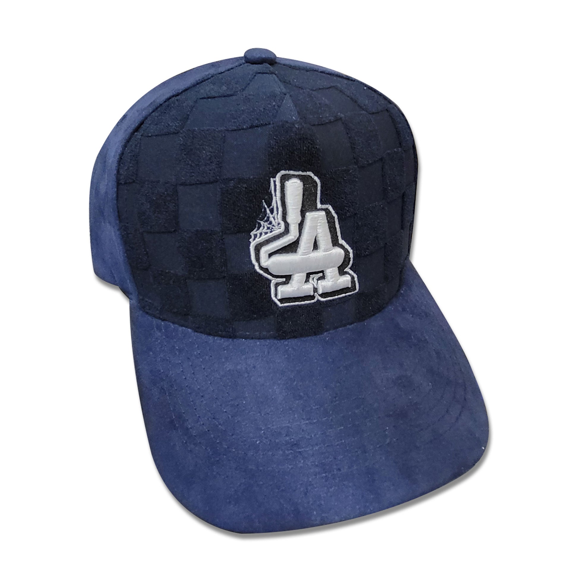 Navy blue suede hat with white embroidery of paint rollers in the shape of the acronym LA with a spider web and checkered pattern.