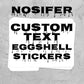 A stack of white eggshell stickers with black dripping text reading 'NOSIFER CUSTOM TEXT EGGSHELL STICKERS' on a textured gray background.