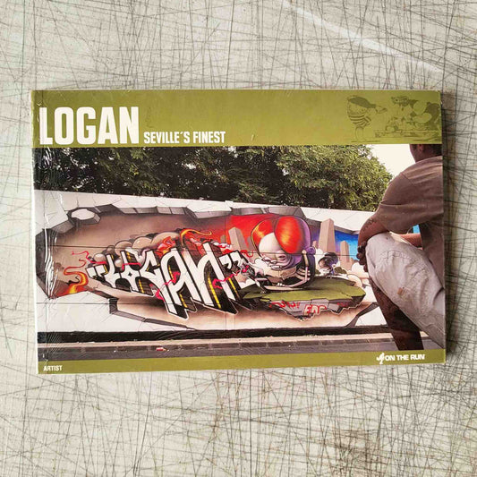 Book "Logan" cover with graffiti art and text on a textured surface