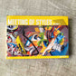Book titled 'Meeting of Styles Volume 1' with colorful abstract design on a textured surface