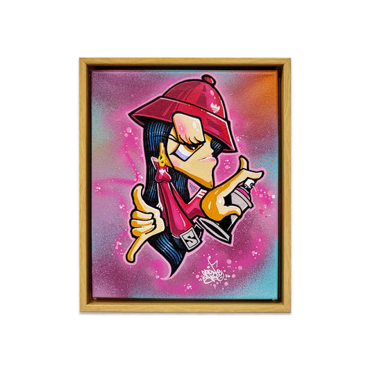 Framed canvas painting of a graffitit 80's stylized breakdancing character with a red hat, spray can and pink background.