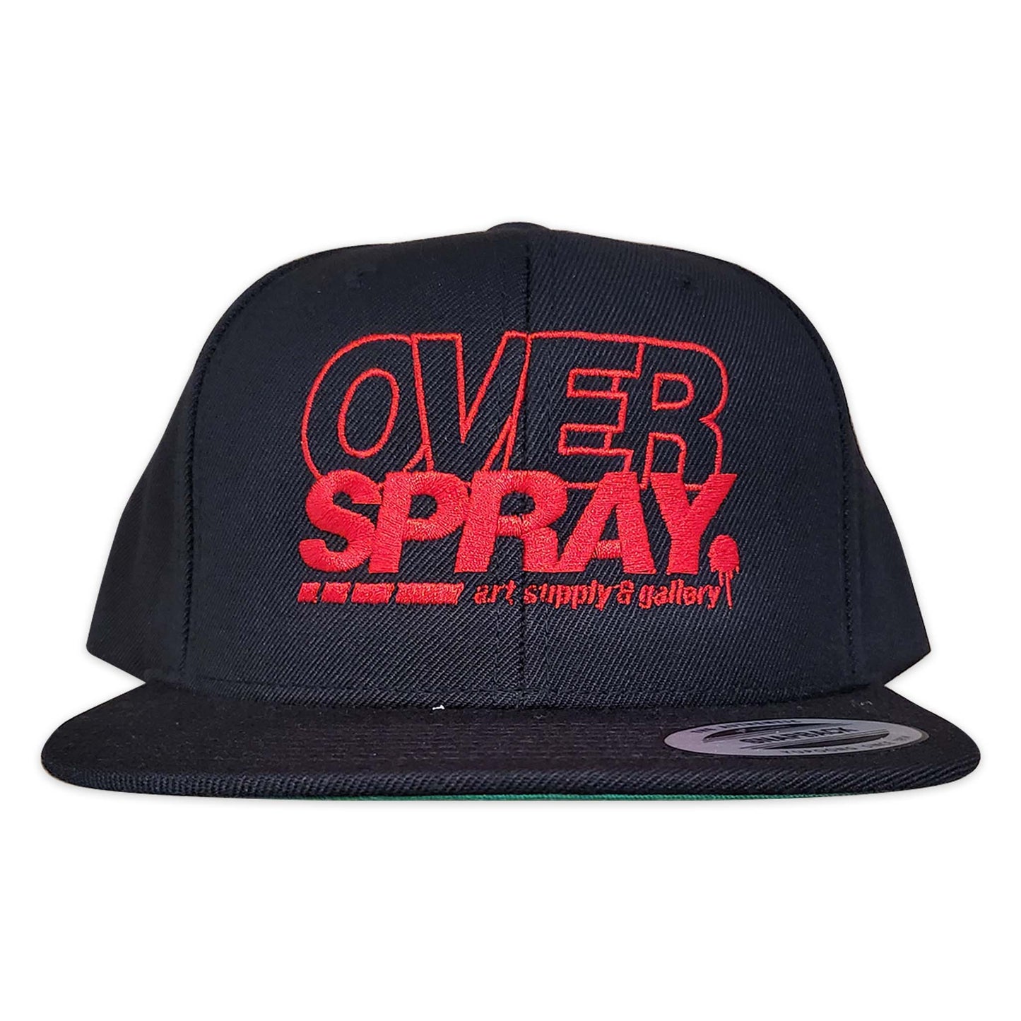 Black cap with red 'OVER SPRAY' text on a white background.