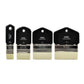 Four short, paddle brushes with black handles and yellow bristles.