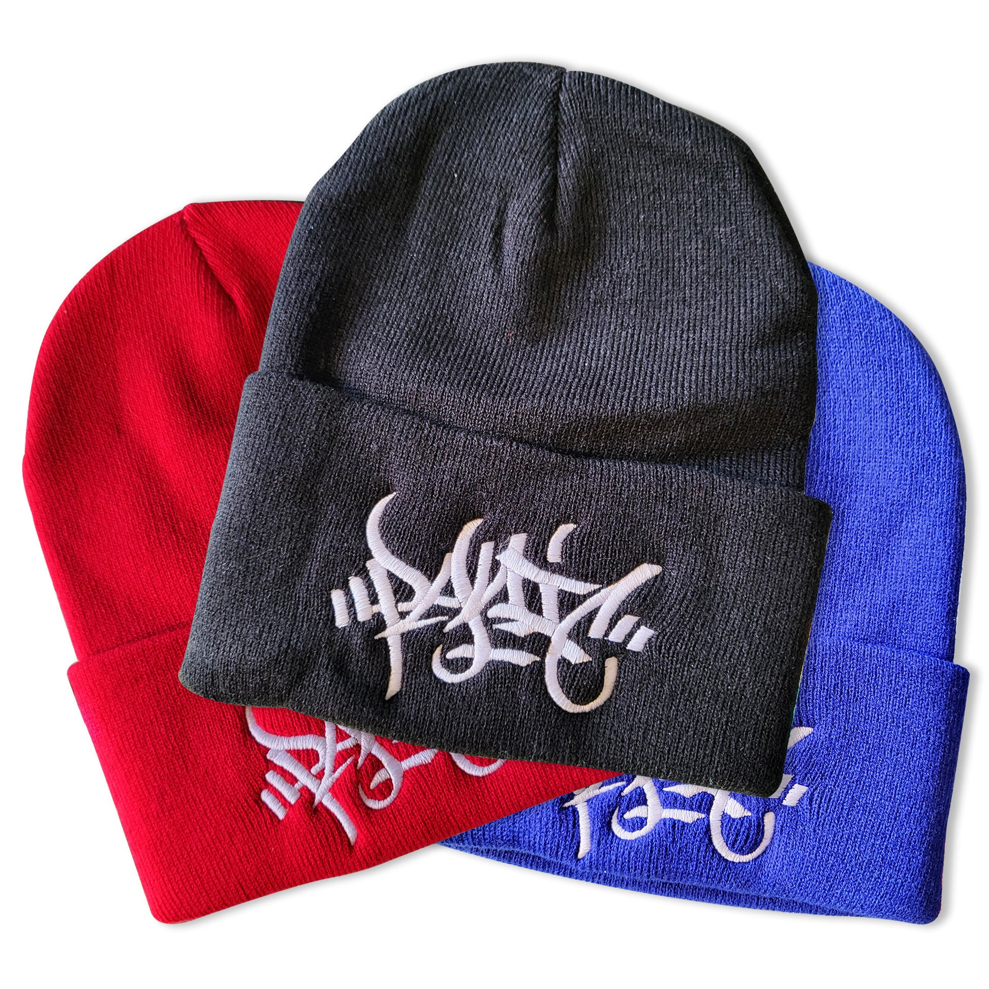 Red,black,blue Panic brand beanies with a centered white panic tag.