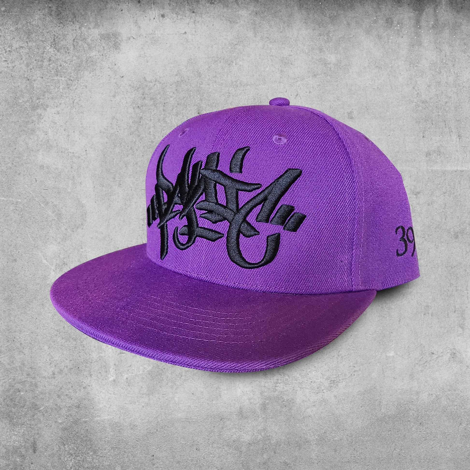 Purple hat with black embroidered tag Panic 39 