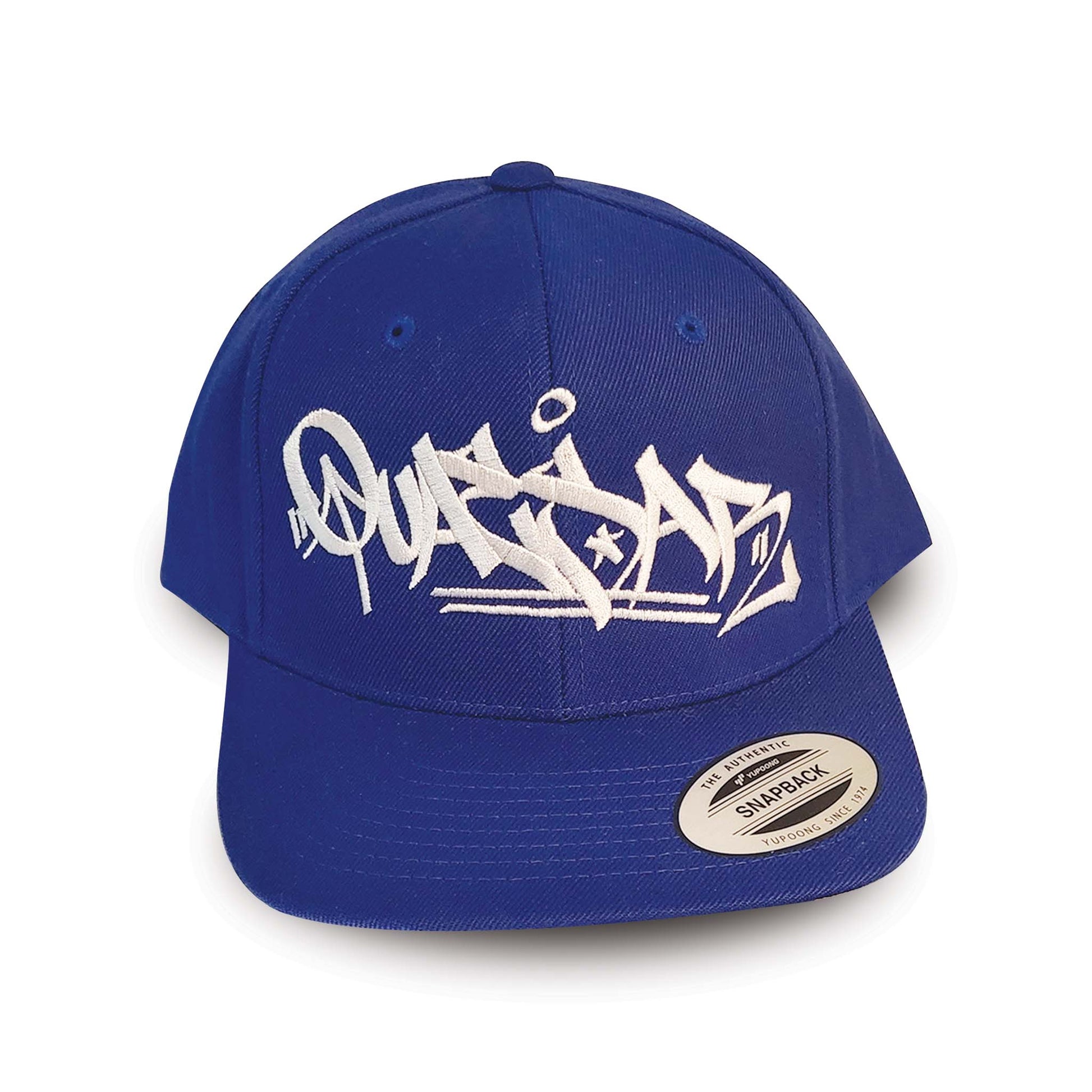 Blue baseball hat with white embroidery of graffiti style writing.