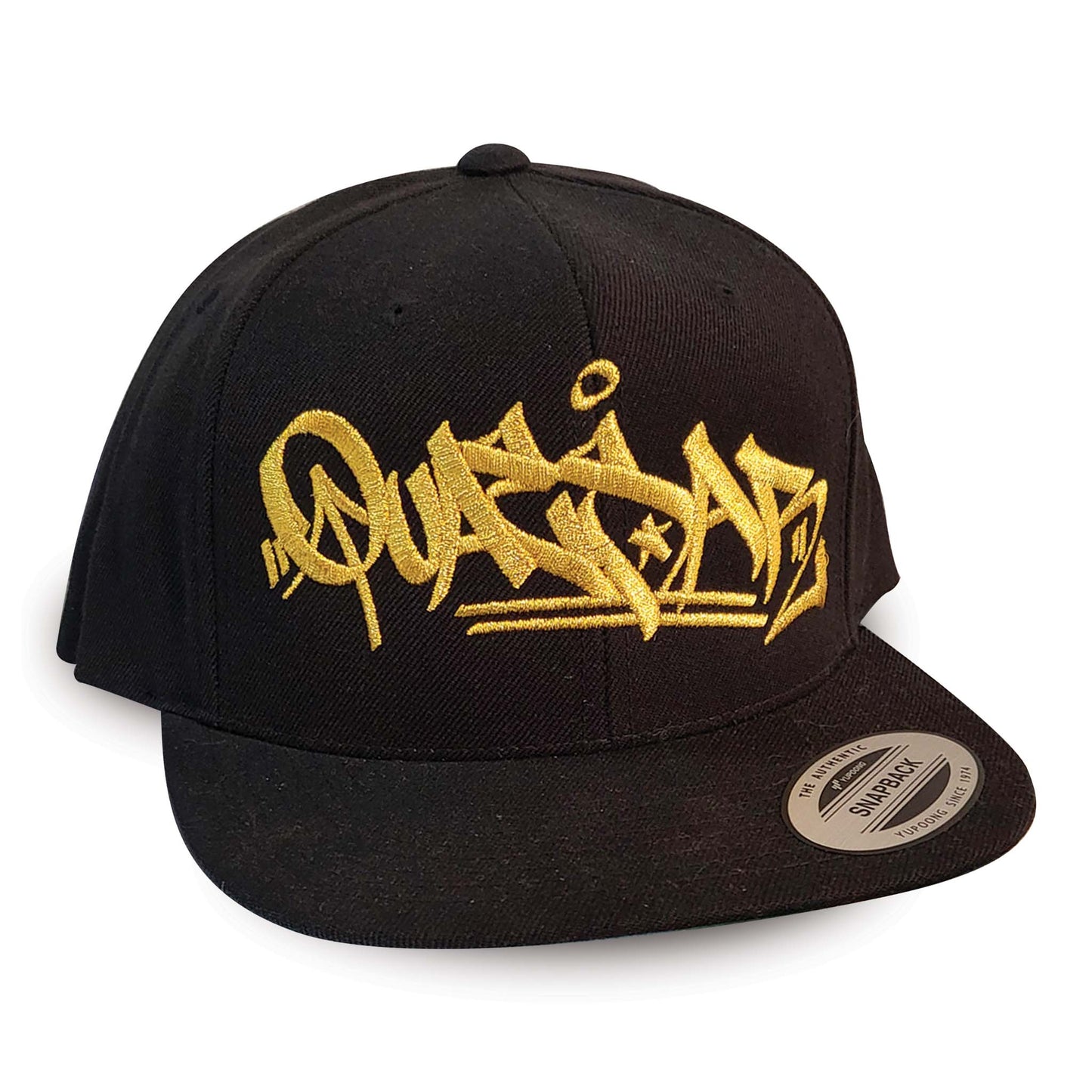 Black straight billed hat with metallic gold graffiti style writing embroidered.