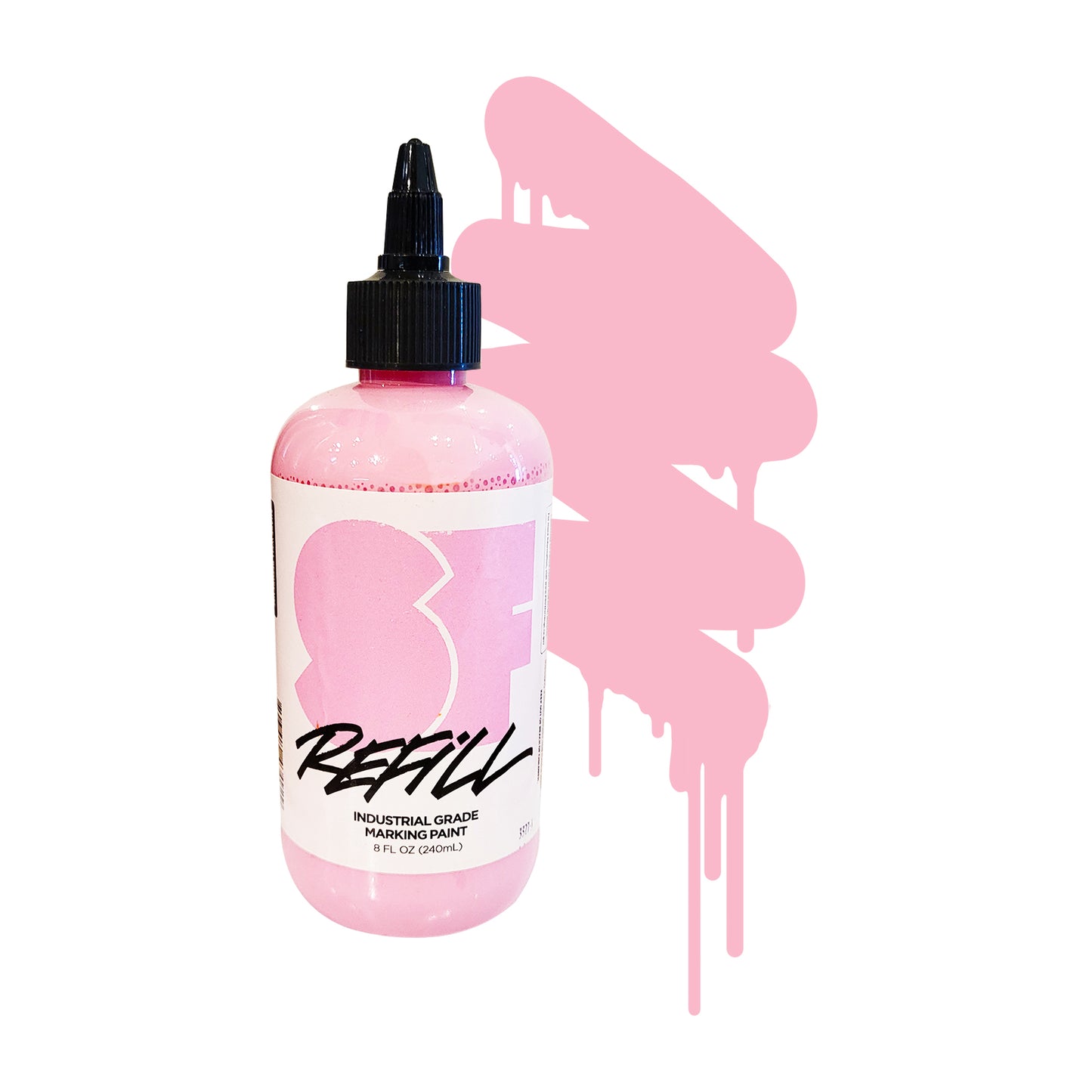 A clear bottle of baby pink paint/ink with a tapered lid and a color swatch to the right of it.